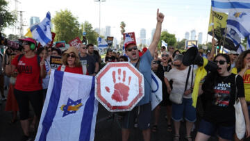 İsrailliler, Gazze kentini işgal kararına karşı esir takası anlaşması talebiyle protesto düzenledi