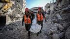 İşgalci İsrail'in Gazze'ye yönelik saldırılarında yıkılan 20 evin enkazından 233 Filistinlinin naaşı çıkarıldı